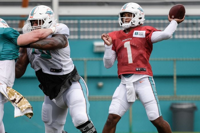 Tua and the Dolphins keep playoff hopes alive in win vs. Rams - ESPN