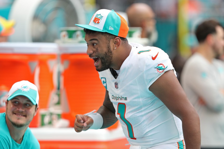 Tua and the Dolphins keep playoff hopes alive in win vs. Rams - ESPN